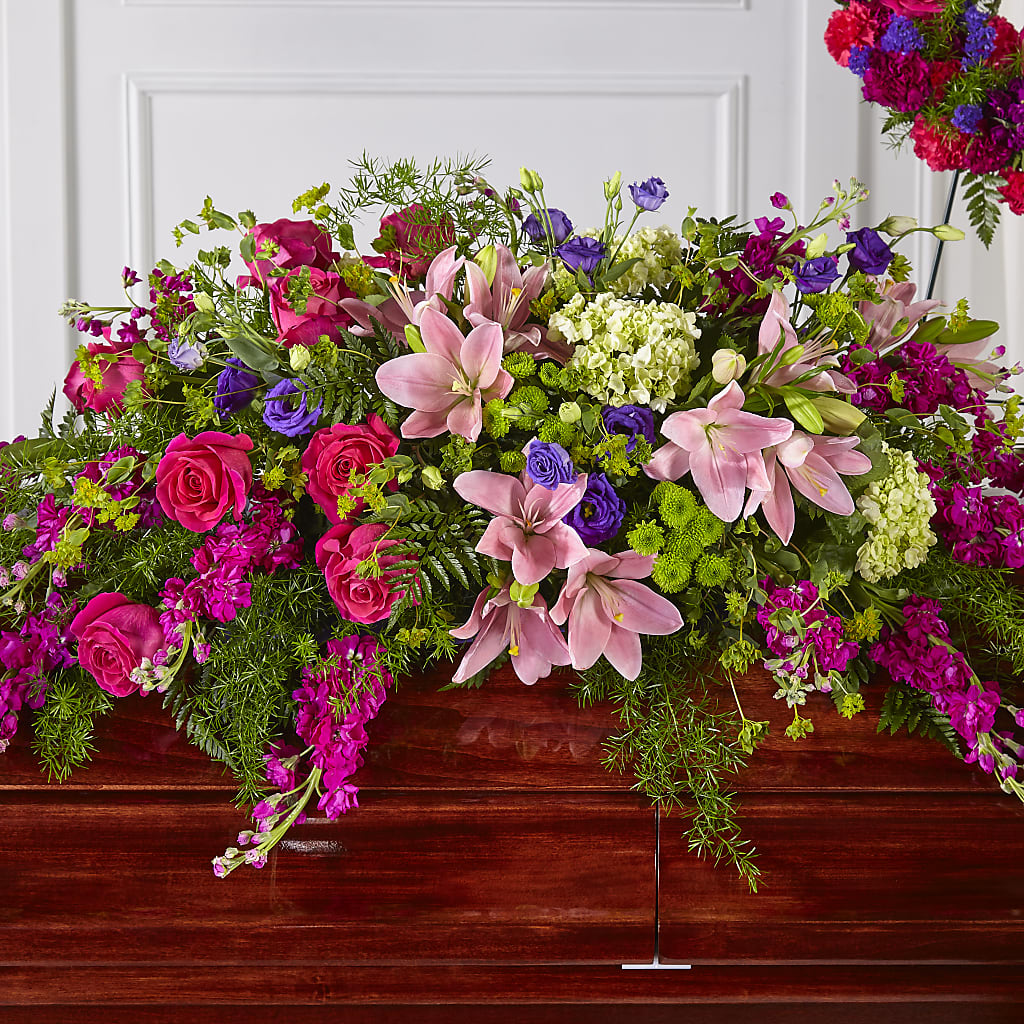 Radiant Tribute Casket Spray – MEME'S FLOWER SHOP LLC, Bay Minette AL