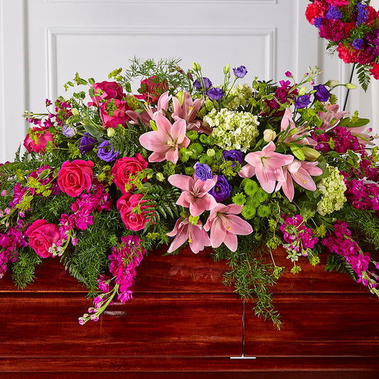 Radiant Tribute Casket Spray – MEME'S FLOWER SHOP LLC, Bay Minette AL